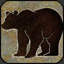 Stone mosaic silhouette standing bear.
